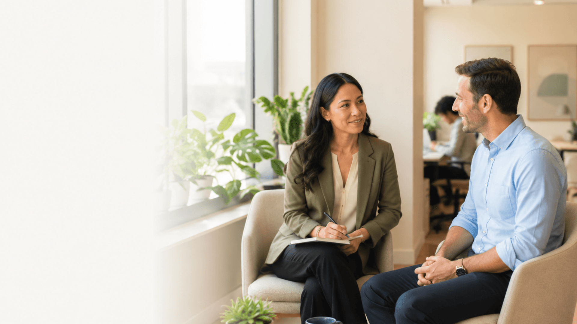 HR leader and team member having a calm, supportive one-on-one conversation